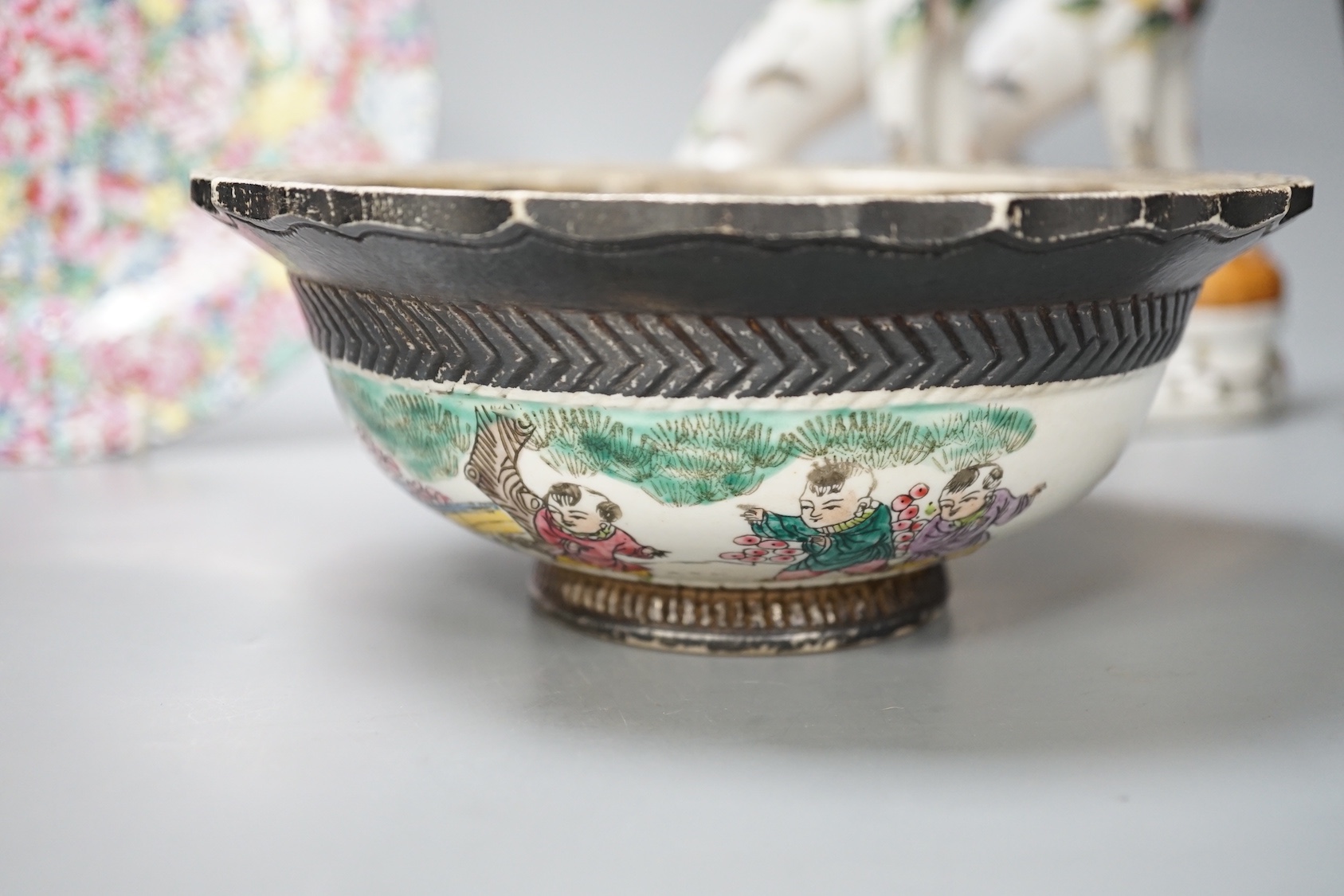 A Chinese porcelain bowl, brush pot, plate and a pair of dogs